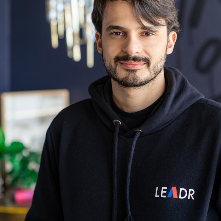 Maya Chen, Client Relations Director, discussing corporate gifting strategy with business clients